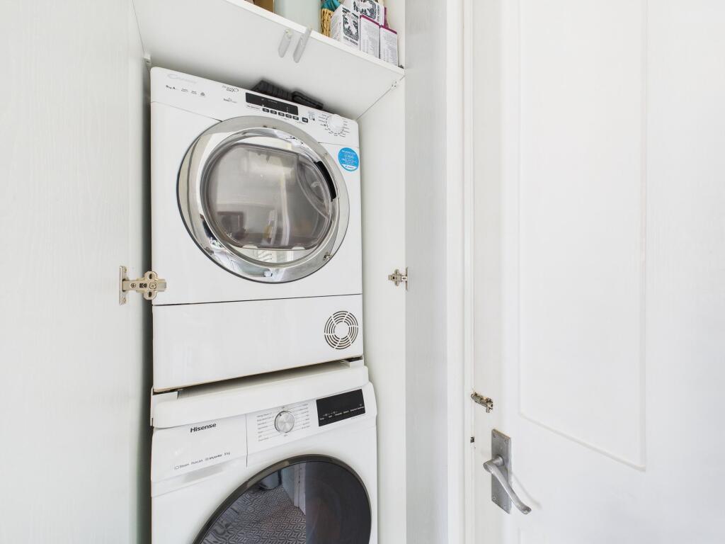 Laundry Area within Bathroom