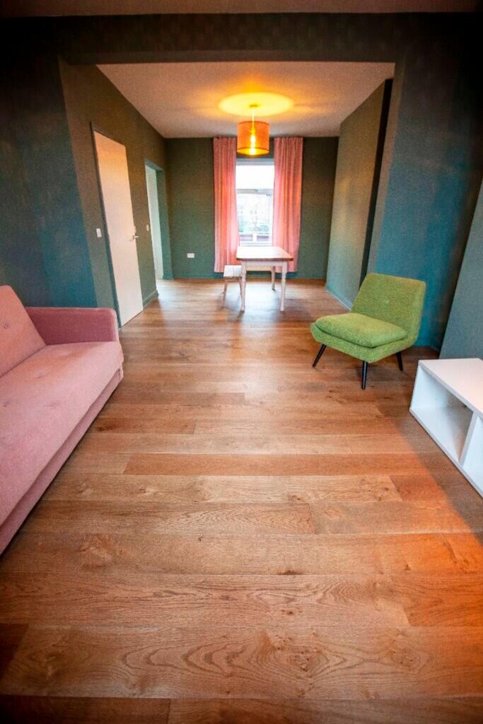 A spacious and stylish modern living room with ...