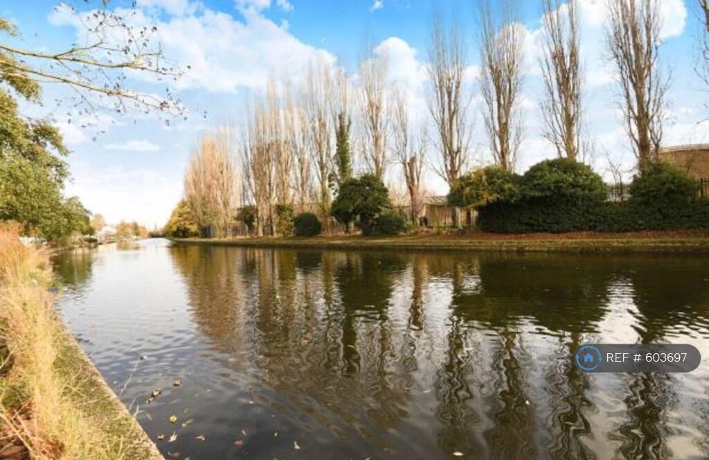 Grand Union Canal In Front Of House