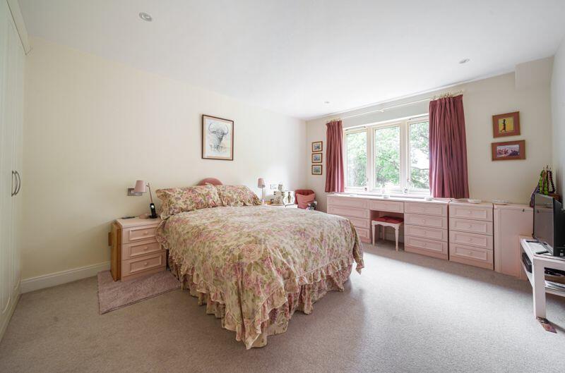 Master bedroom with fitted wardrobes