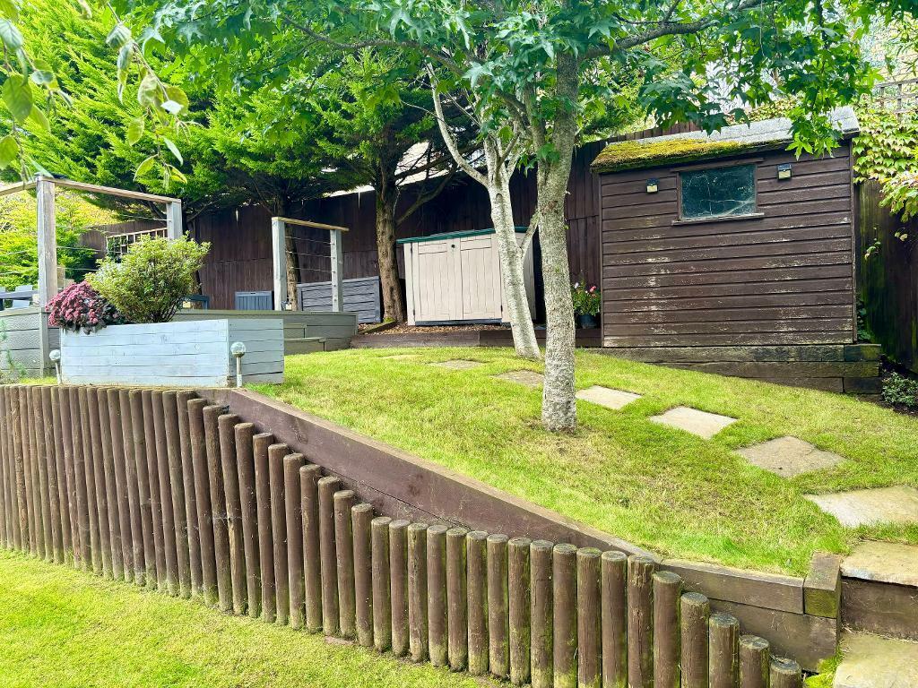 Garden Area Leading To Top Terrace