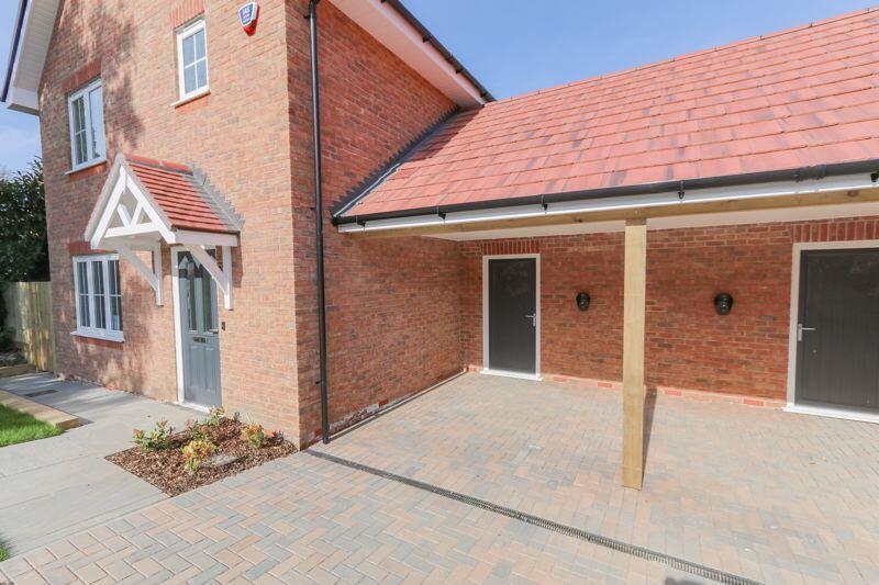 Covered Carport and Enclosed Garden S...