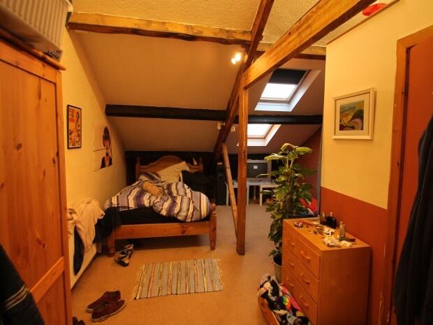 A compact bathroom area featuring a small WC wi...