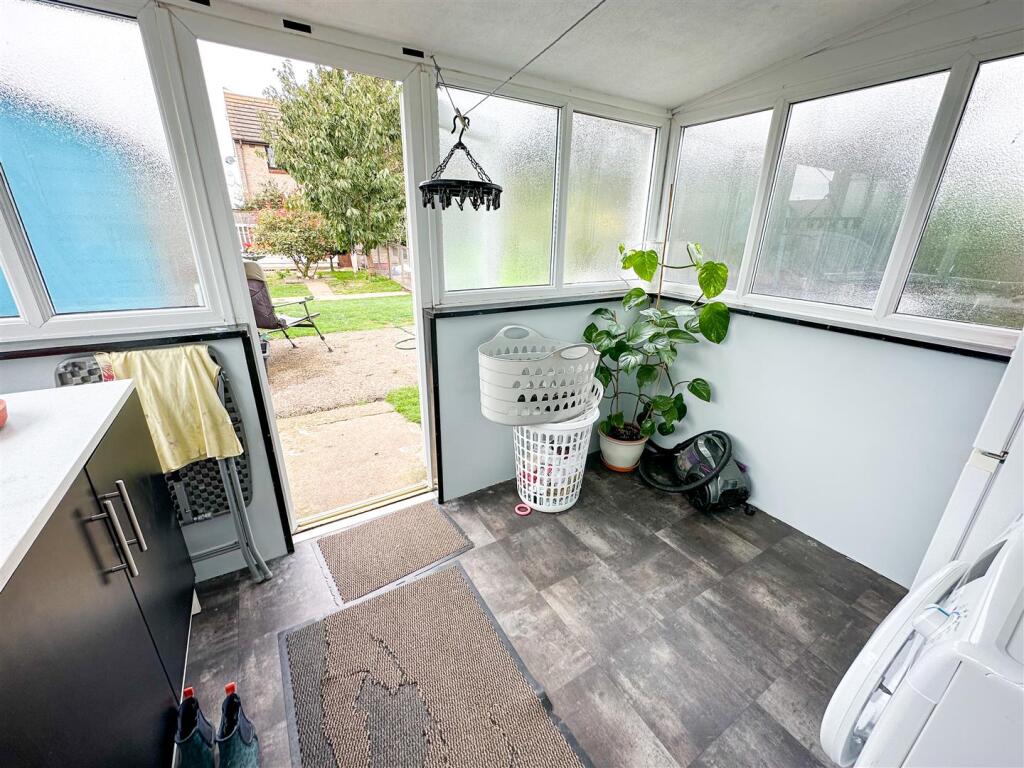 SUN LOUNGE/UTILITY ROOM