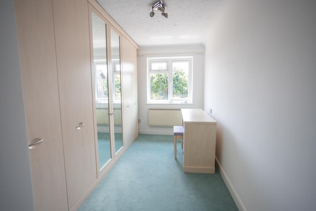 Bedroom 2 with wardrobes