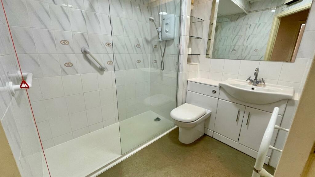RE-FITTED THREE PIECE SHOWER ROOM