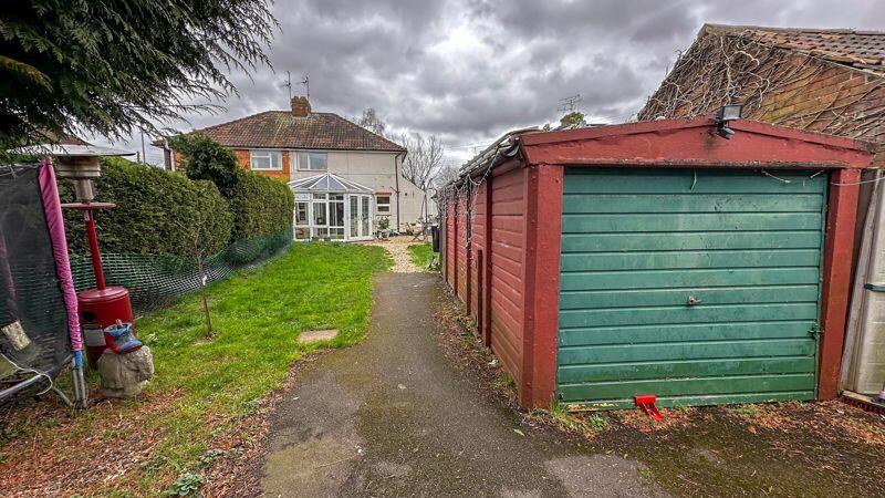 GARAGE AND PARKING TO REAR