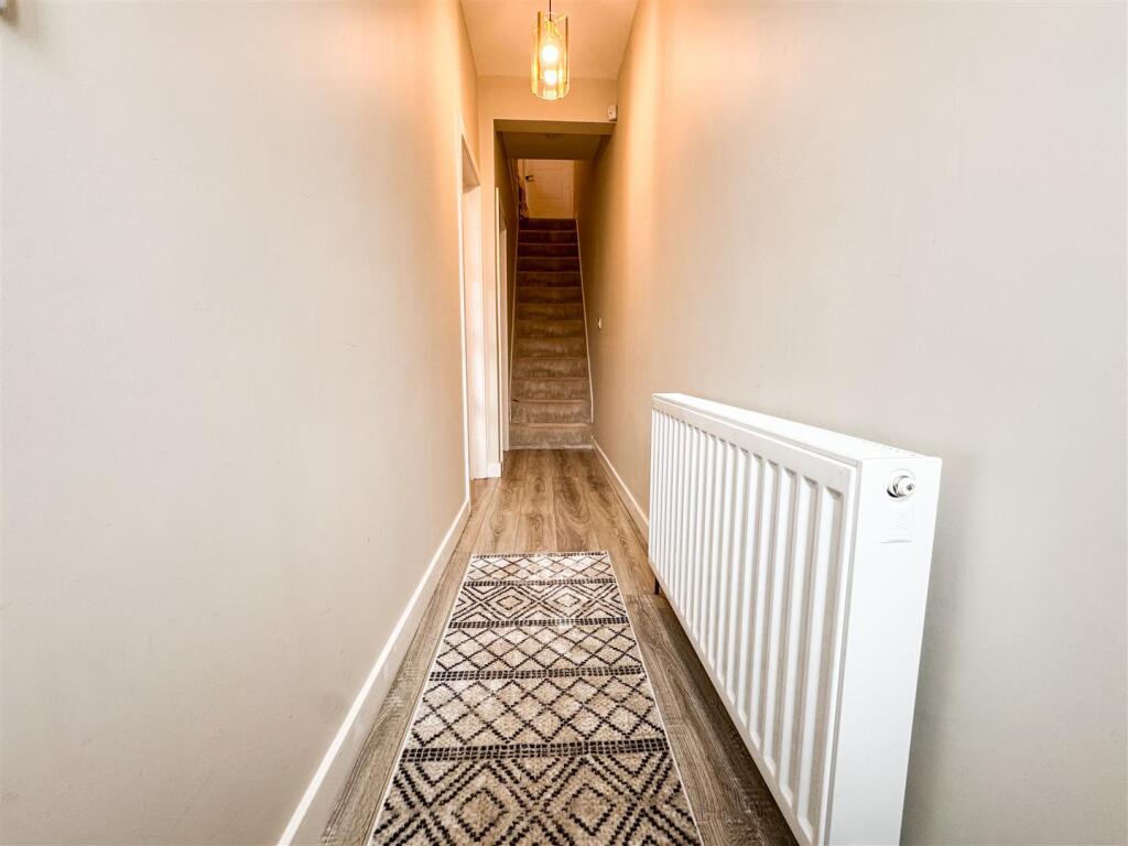 STAIRS RISING TO THE FIRST FLOOR