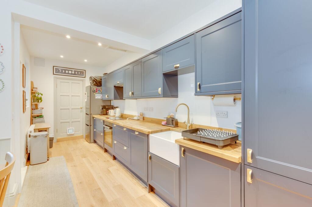 DINER OPENING TO EXTENDED FITTED KITCHEN