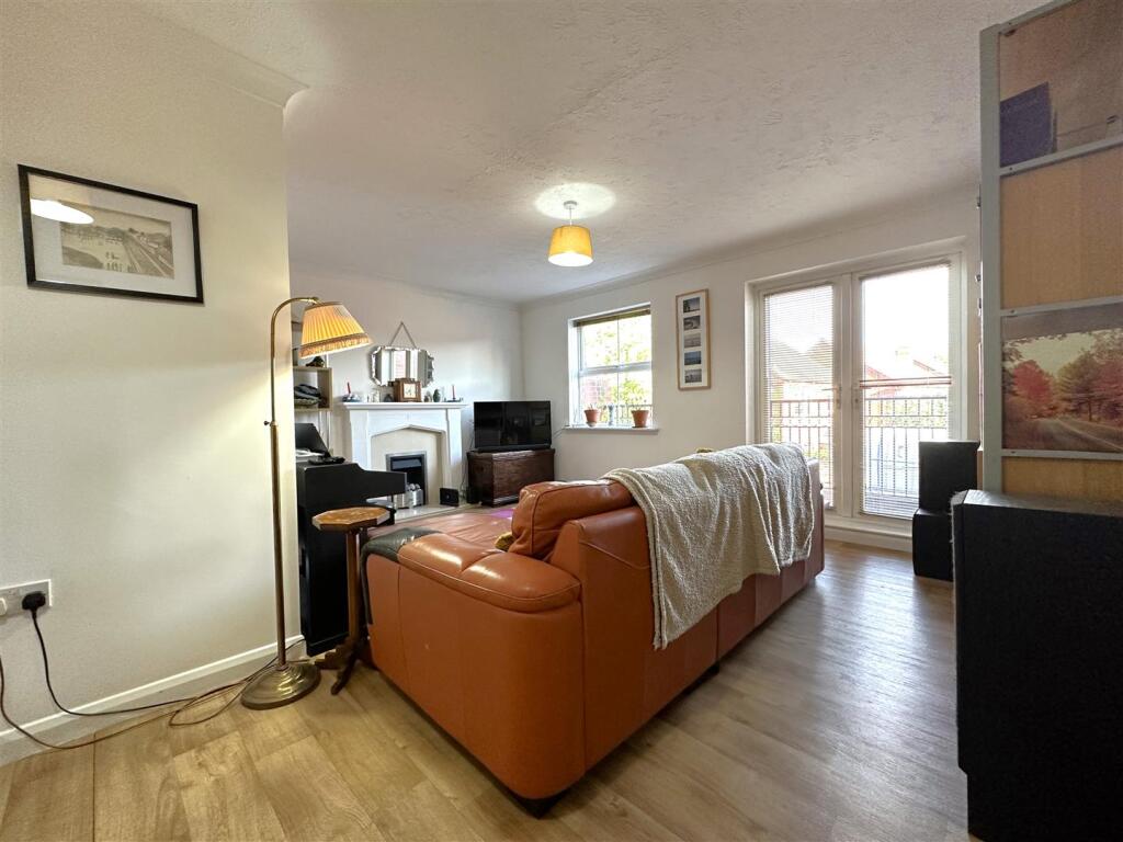 Living Room With French Doors Onto Balcony 955