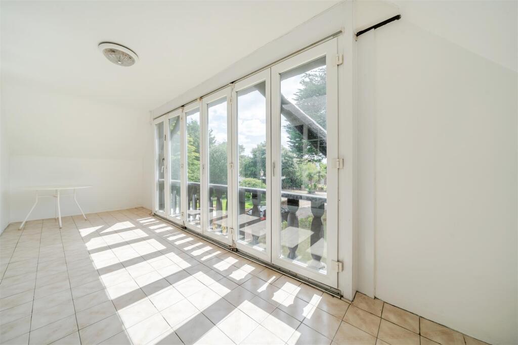 Upstairs Enclosed Balcony