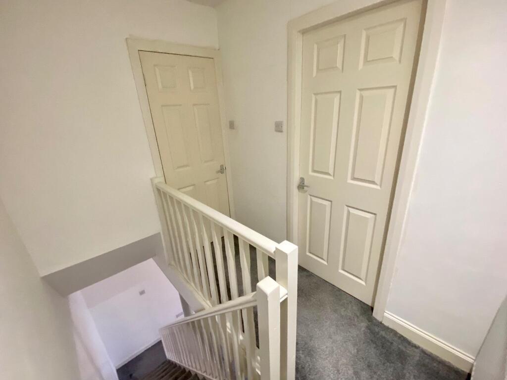 STAIRCASE TO THE FIRST FLOOR: