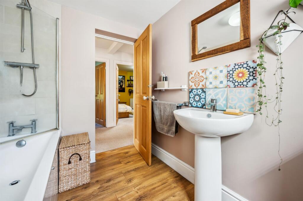 Bathroom - sink and shower.jpg