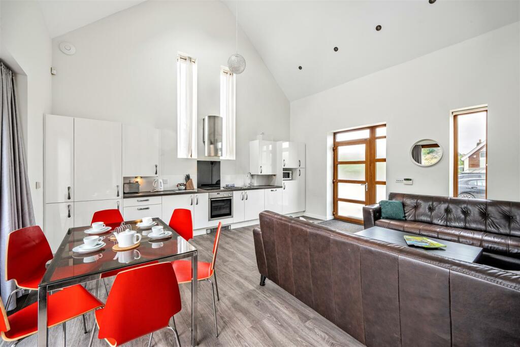Open plan sitting/kitchen/dining area