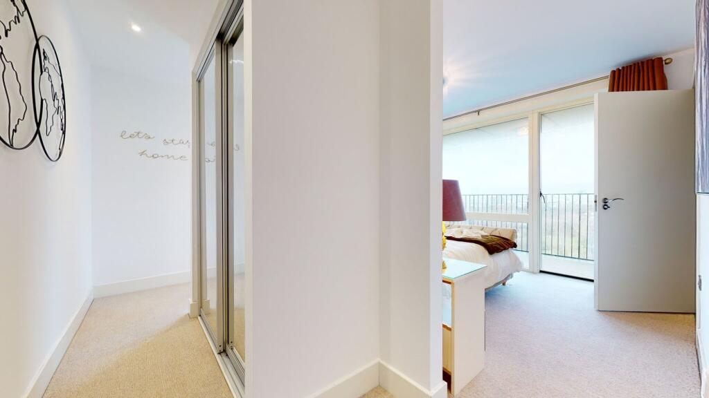 Bright and airy double bedroom featuring a larg...