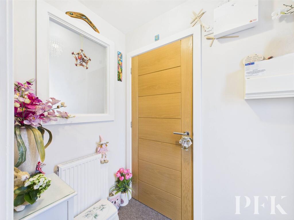 Hallway with door to WC