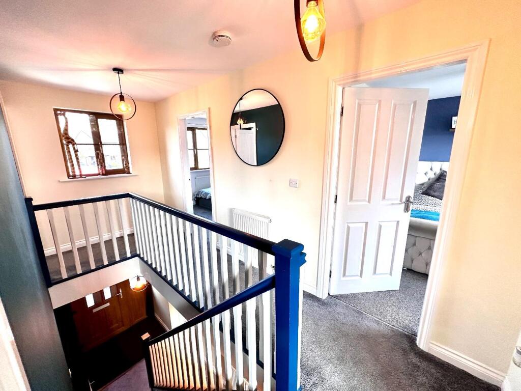 TO THE FIRST FLOOR LANDING