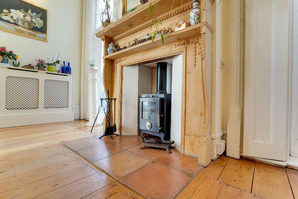 Warming log burner in the kitchen