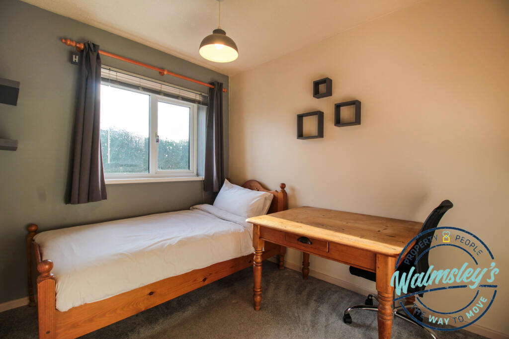 Rear bedroom with fitted wardrobes