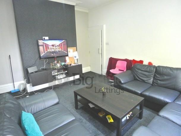 Contemporary living room featuring comfortable ...