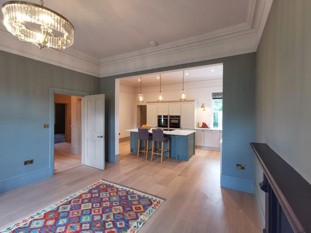 Spacious rooms with oak wooden flooring