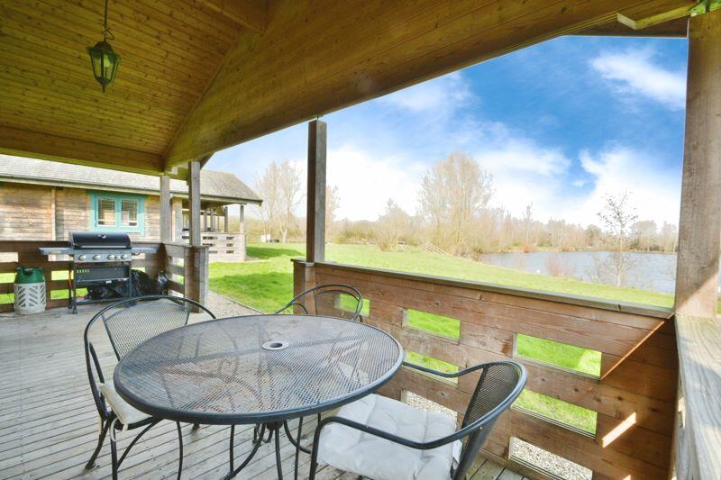 Covered decking with lake views