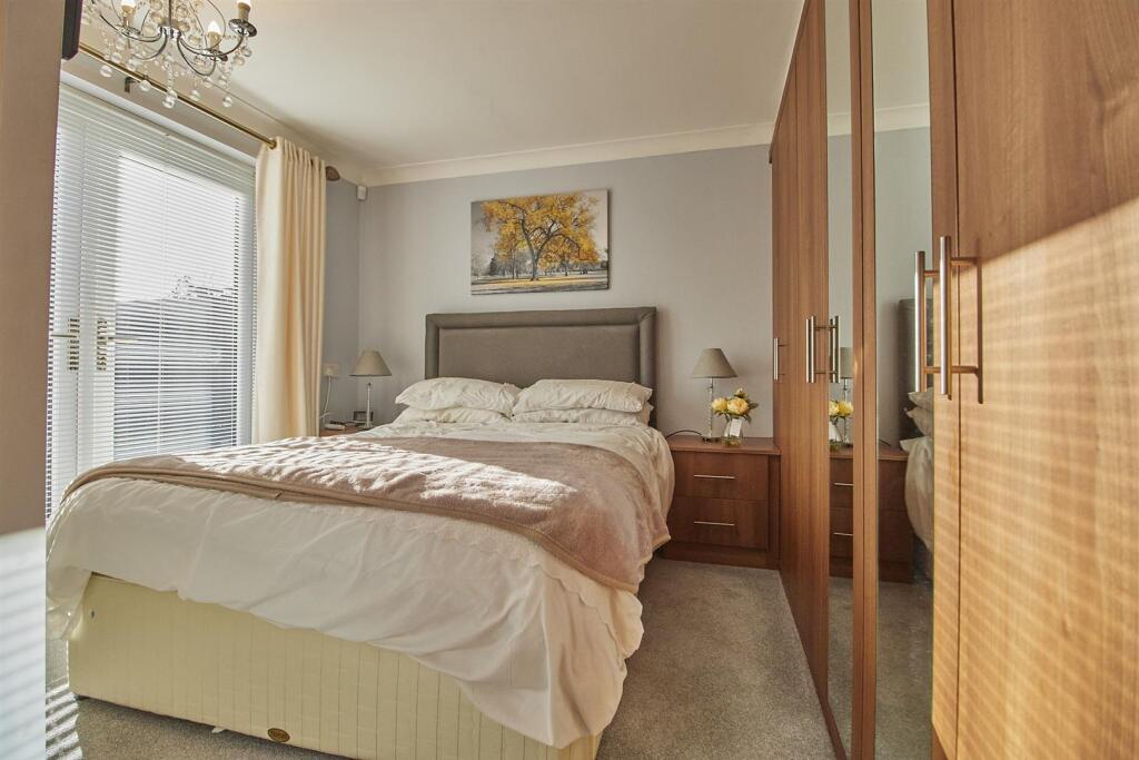 L SHAPED REAR BEDROOM ONE