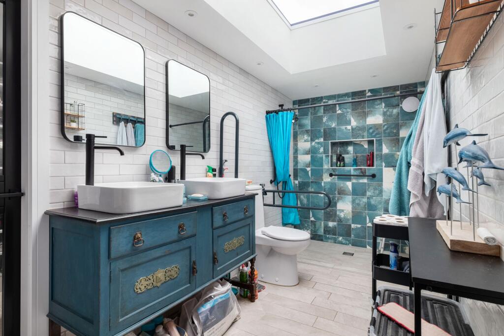 DOWNSTAIRS SHOWER ROOM AND W/CS