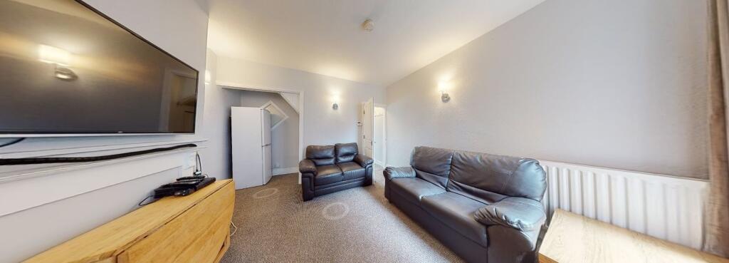Bright and welcoming living room featuring two ...