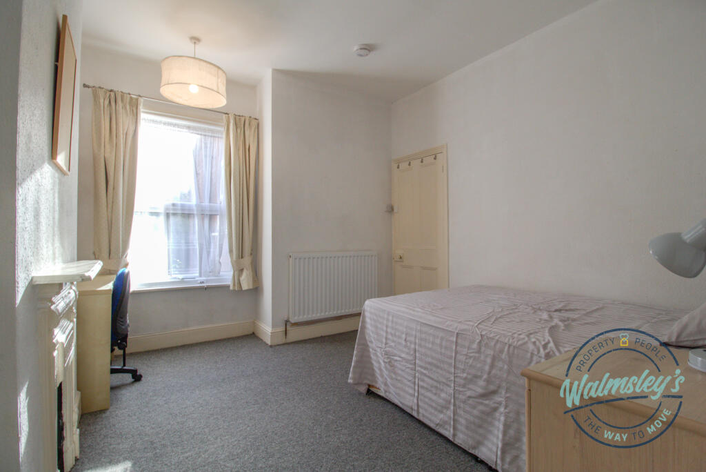 Bedroom two with built in wardrobe