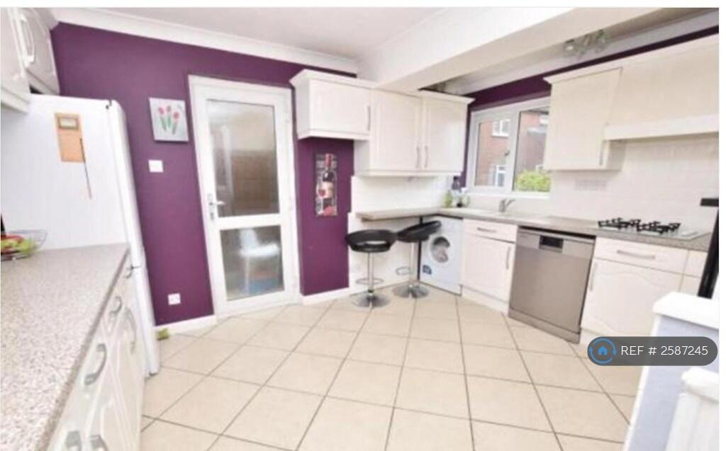 Spacious Kitchen With Breakfast Bar