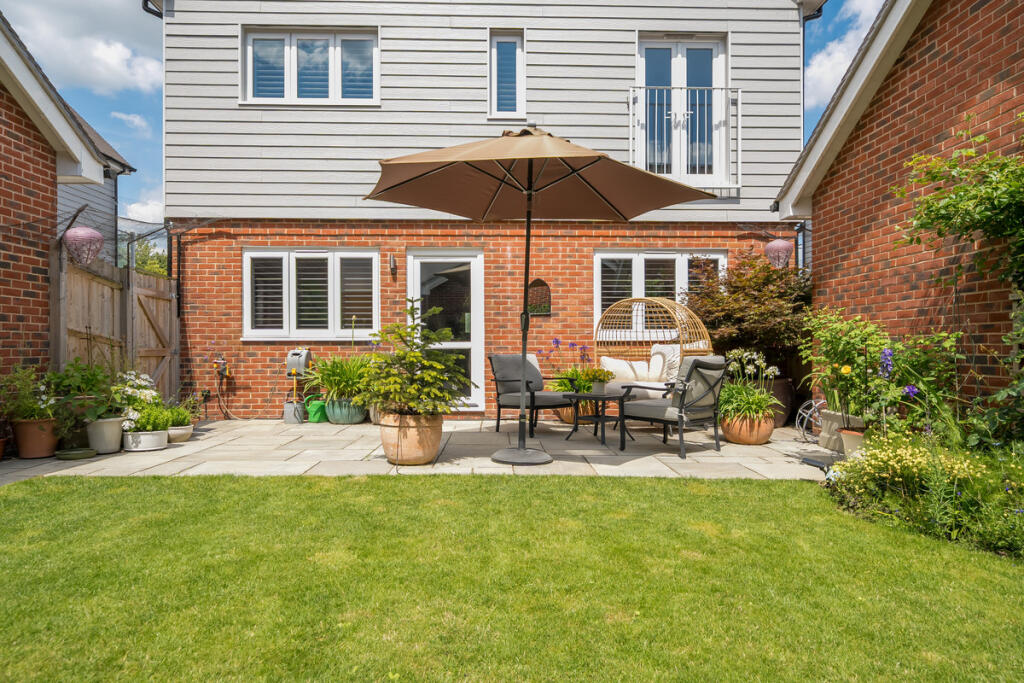 South facing private rear garden with newly laid Indian sandstone terrace