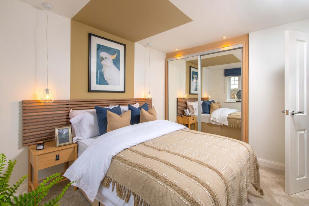 Kennett yellow double bedroom