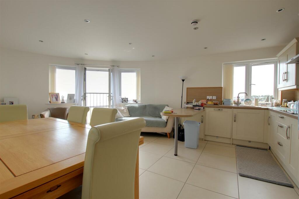 LIVING ROOM WITH KITCHEN AREA