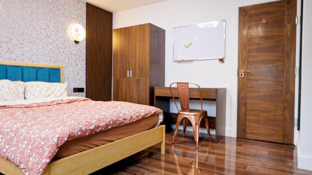 A stylish and inviting double bedroom featuring...