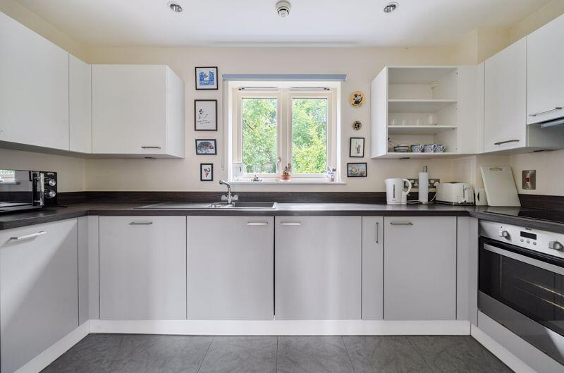 Kitchen with built-in appliances