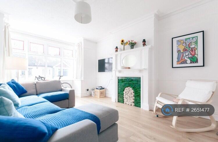 Large Reception Room Featuring High Ceilings. 