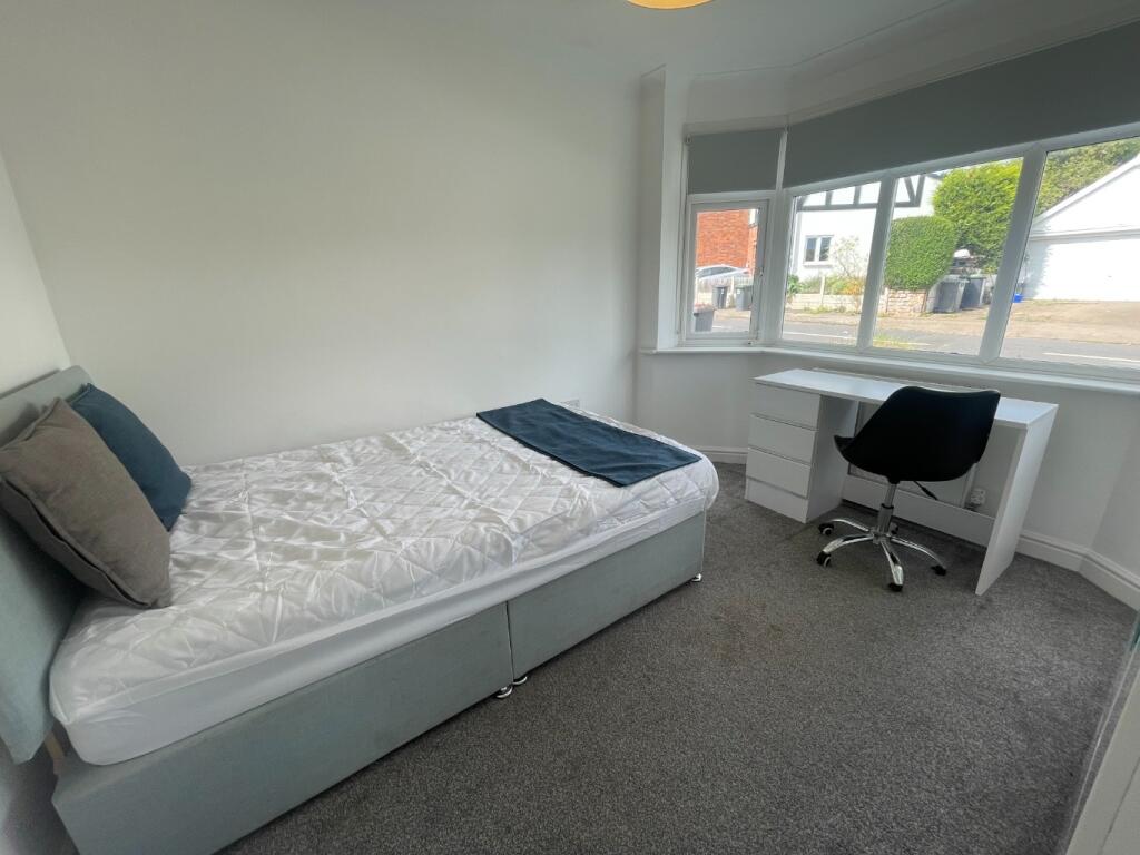 This bright and inviting double bedroom feature...