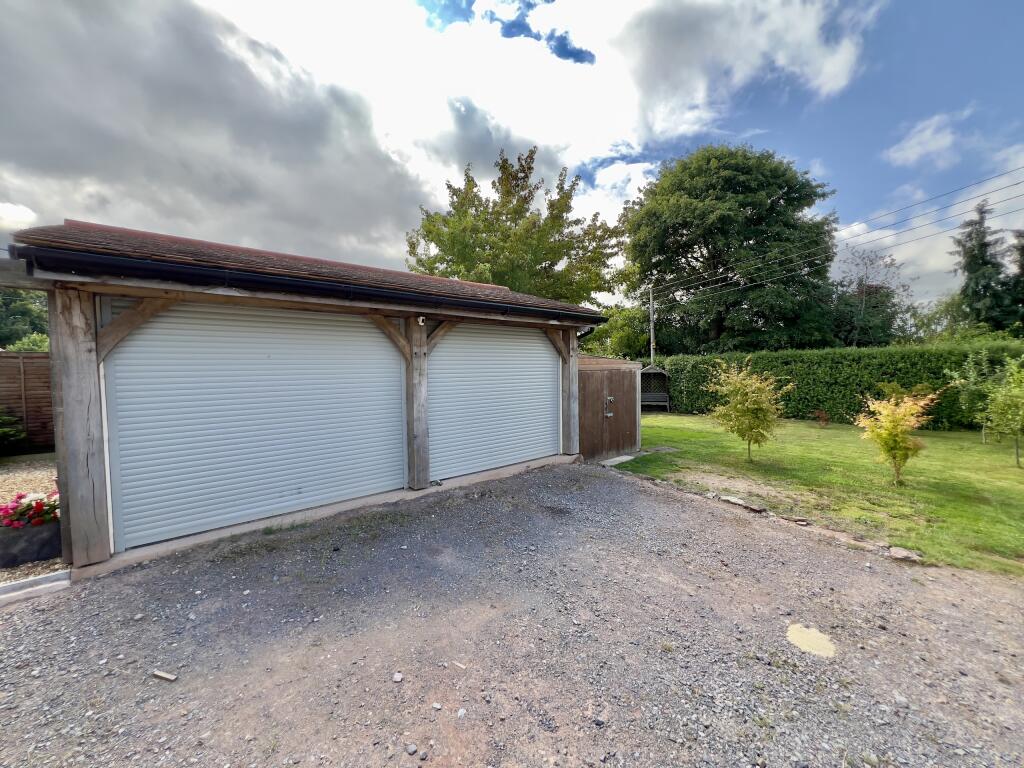 Double garage and front lawn