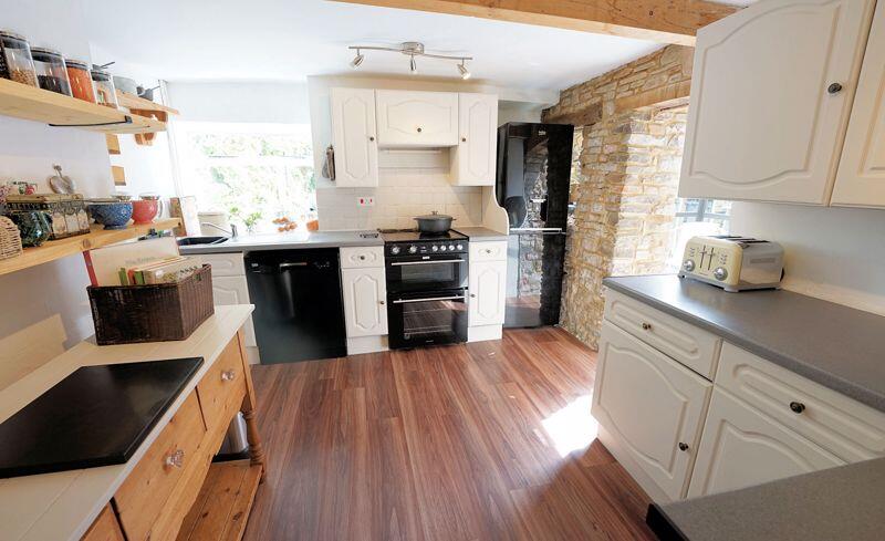 Kitchen leading to a conservatory