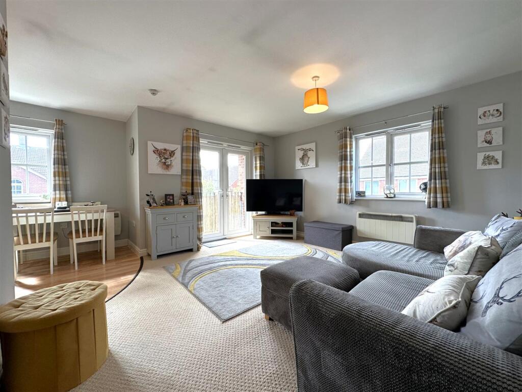 Generous Living Room With French Doors 034