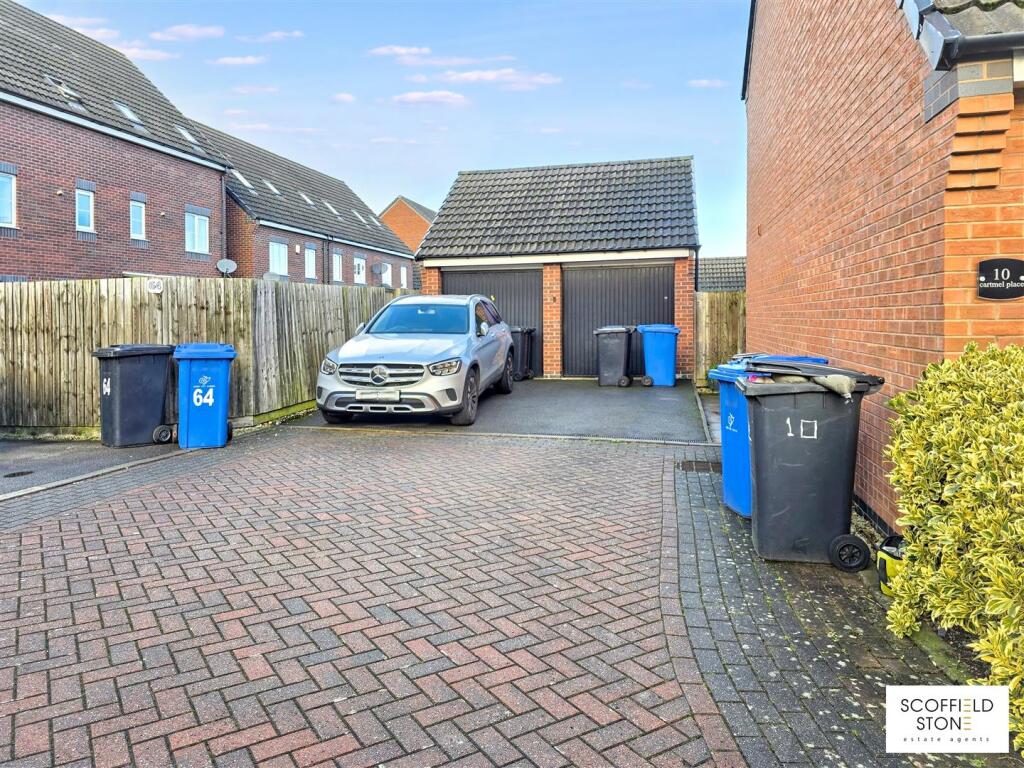 Driveway and Garage (via Cartmel Place)