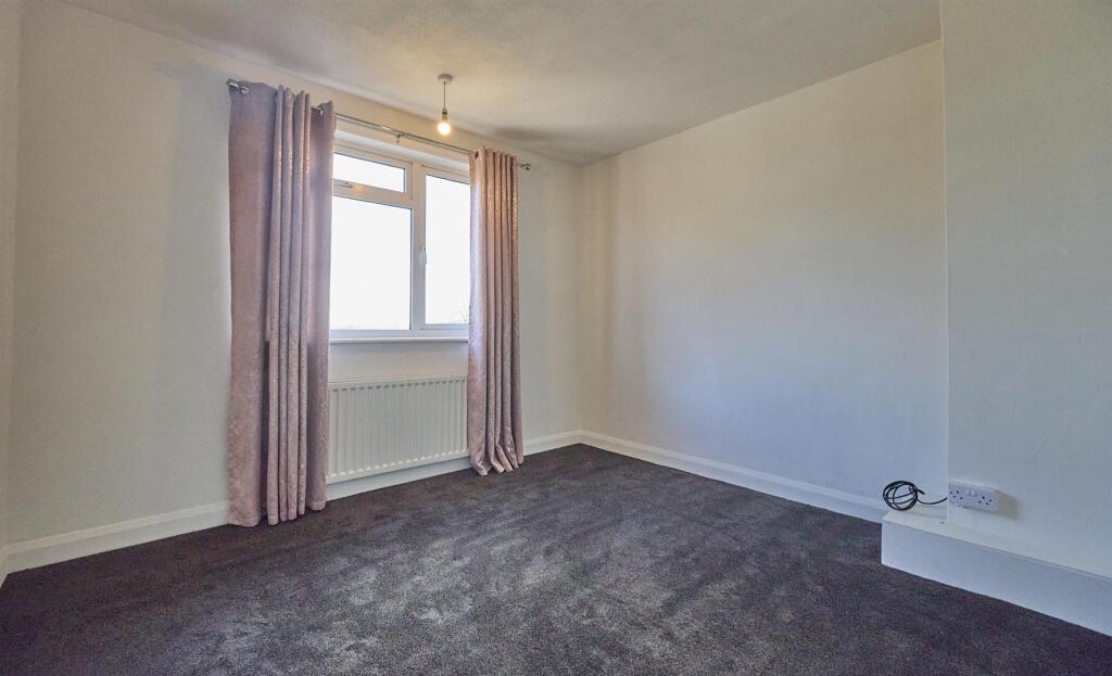 BEDROOM TWO TO REAR
