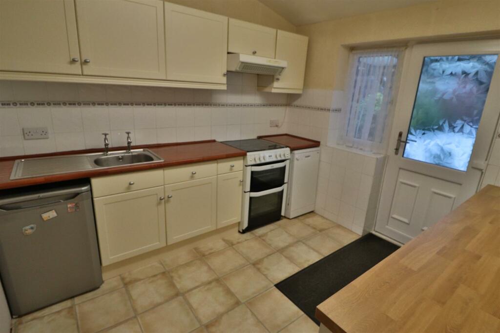 OPEN PLAN FAMILY ROOM/KITCHEN