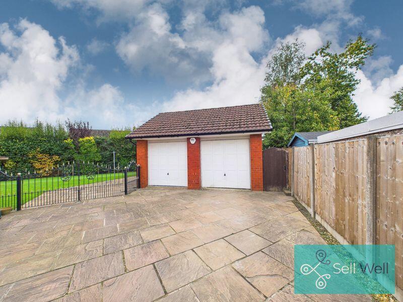 Double Detached Garage/Driveway