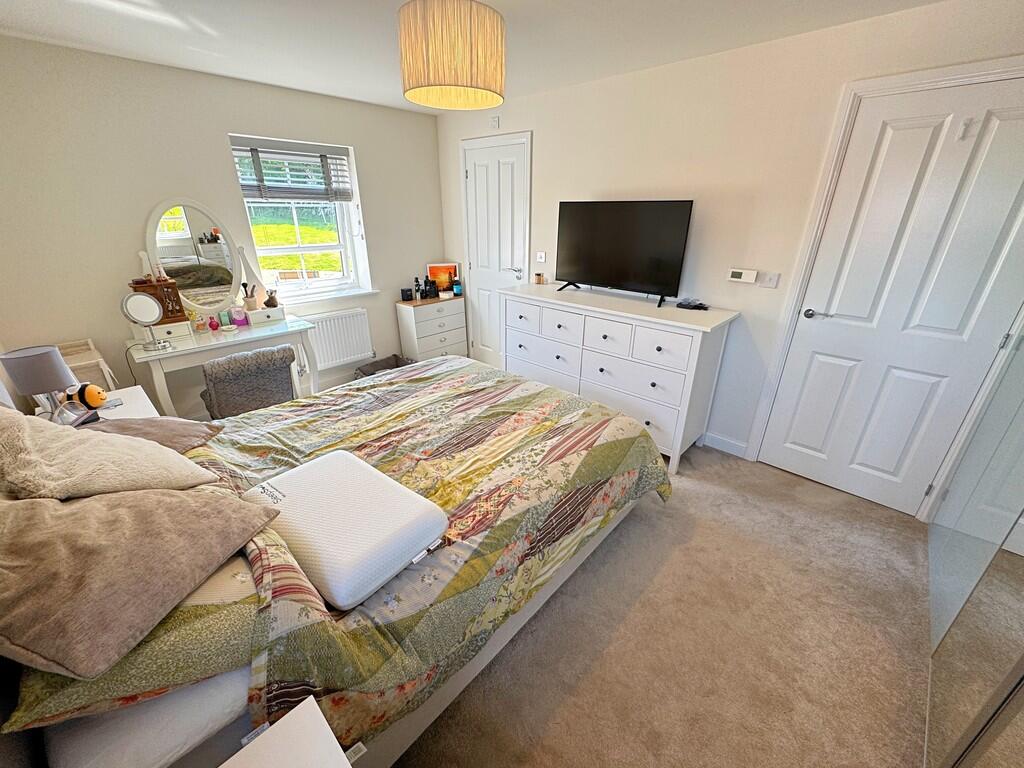 Bedroom One alt a...