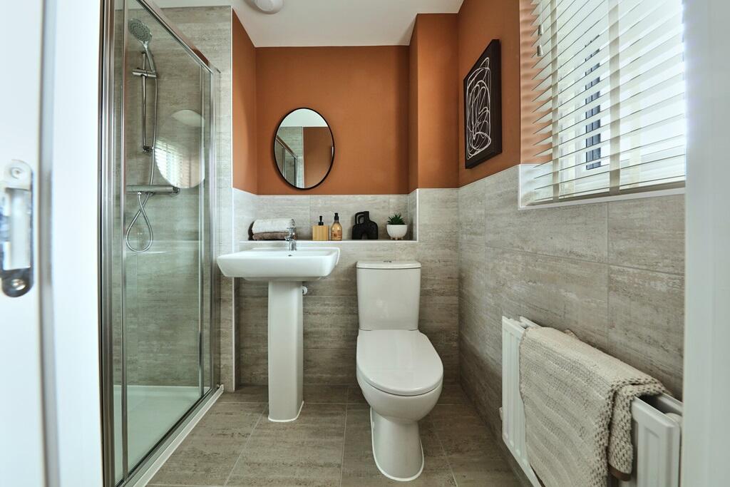 The main bedroom benefits from an en suite shower room