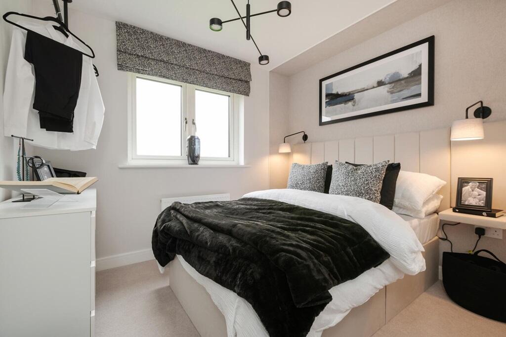 There's a spacious second double bedroom, ideal for guests