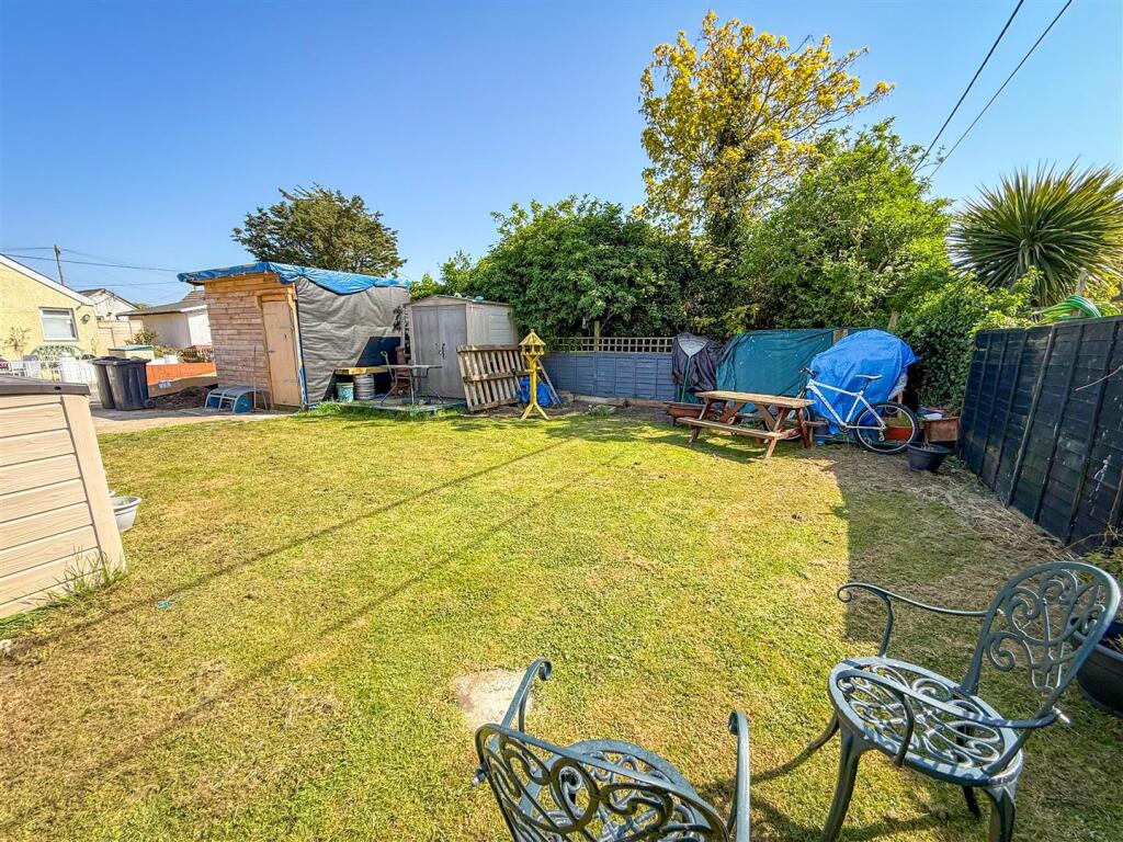 SIDE AND REAR GARDENS