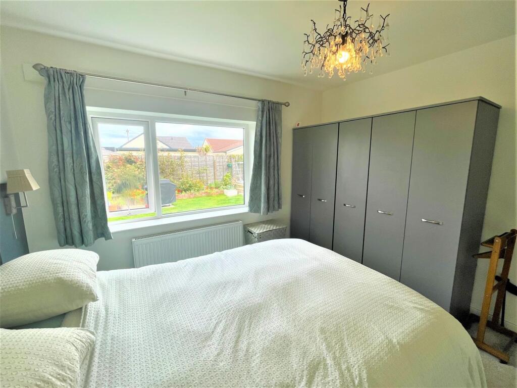 Bedroom with wardrobes.jpg